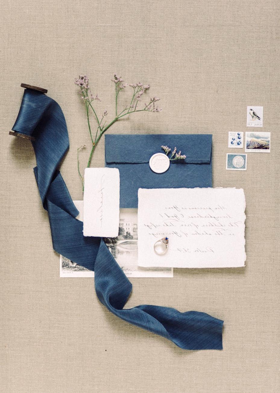 Calligrapher's workspace with pens, ink and papers